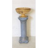 A modern painted Grecian style pillar and urn