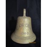 A brass ships bell from the "M.V. Nzam Creek" ( a tunnel type pusher tug, Nigeria) dated 1960,