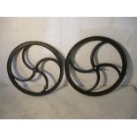 A similar pair of cast iron wheels
