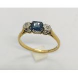 An 18ct gold diamond and sapphire 3 stone ring