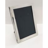 A hallmarked silver photo frame, 15cm x 11.25cm