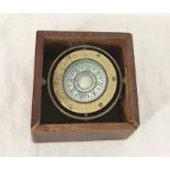A cased brass gimbal compass "Funseng Tankee, Hong Kong"