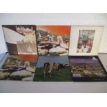 A collection of four Led Zeppelin 12" albums including Led Zeppelin 2 (Plum/Red Label), Presence,