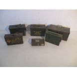 A collection of various sized ammo boxes