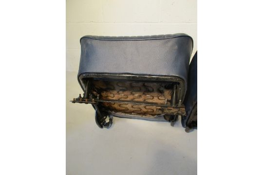 A pair of vintage car seats
