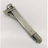 A hallmarked silver cigar cutter