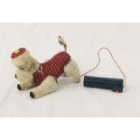 A battery operated Scotty dog with tartan coat. Light up eyes and movable legs and tail