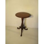 A Victorian tripod occasional table