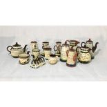 A collection of Torquay ware including tea pot, coffee pot, toast rack etc.