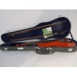 A cased Yamada violin with two bows