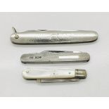Two silver penknives along with a silver bladed fruit knife