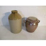 A stoneware storage jar, along with lidded two handled pot