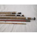 Three vintage fishing rods in canvas bags including "The Expert", George Wilkins rod and an Edgar