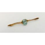 A 9ct gold brooch set with an aquamarine