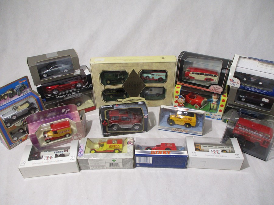 A collection of boxed die-cast vehicles including Corgi, Dinky, Gilbow etc