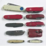 A collection of vintage penknives etc.