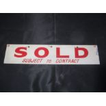 A vintage estate agents metal "Sold" sign, with "Reserved" to reverse.