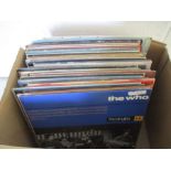 A collection of 12" vinyl records including The Who, John Lennon, Billy Joel, Paul McCartney, Bee