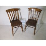 A pair of slat back country chairs