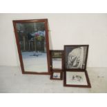 A rectangular wooden framed wall mirror, along with a framed tile of Dutch harbour scene, framed