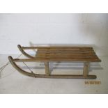 A vintage wooden sledge.