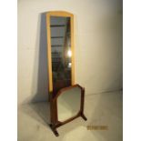 A modern beech cheval mirror along with an octagonal toilet mirror