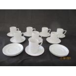 A Portmerion "Totem" part coffee set consisting of 8 cups and 12 saucers