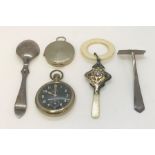 An Ingersoll Defiance 1940's pocket watch along with a silver baby's teething ring, silver spoon and
