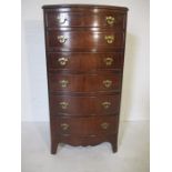 A bow fronted chest of six drawers. Height 116cm