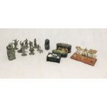 A collection of various items including two carved figures (one possibly Inuit) pewter figures,