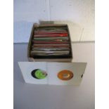 A collection of 7" vinyl records including David Bowie, Cliff Richard, Nazereth, Roy Orbison, Art