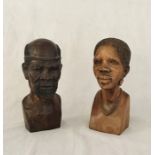 Two carved wooden African busts