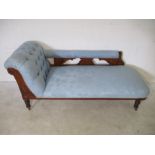 A late Victorian chaise lounge with button backed detailing