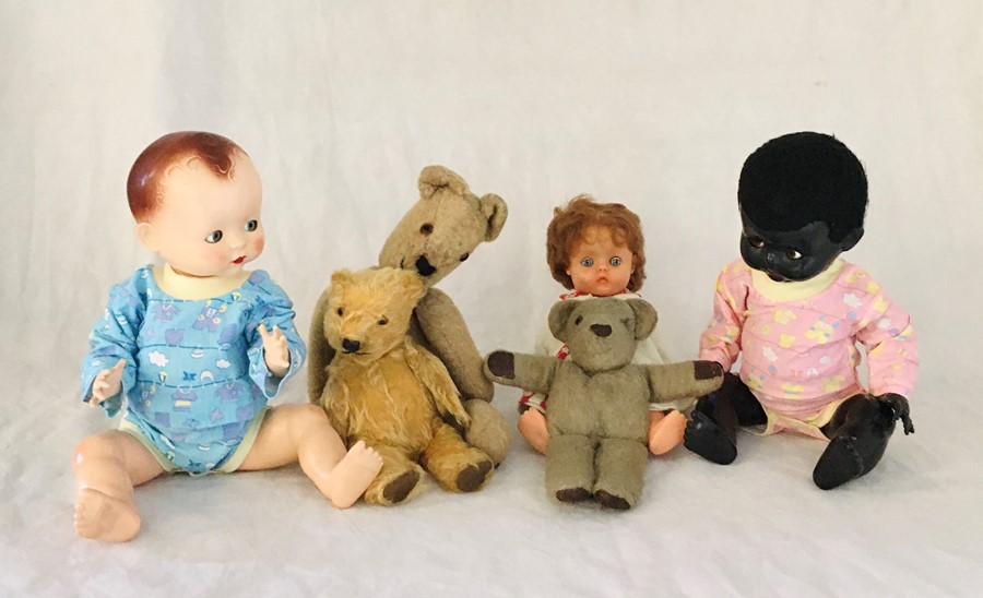 A collection of vintage dolls and teddies including Pedigree etc.