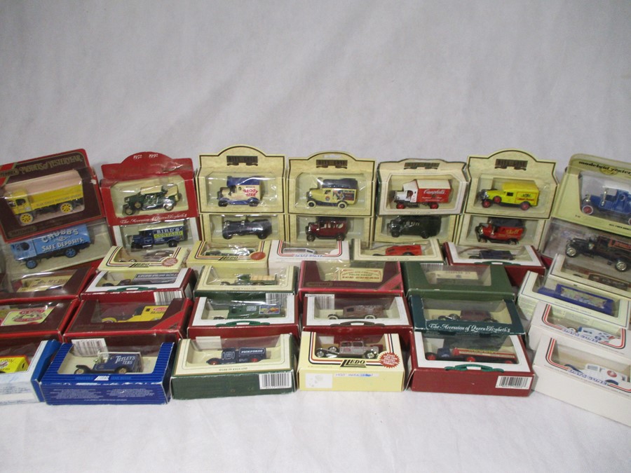 A collection of boxed die-cast vehicles including Lledo Days Gone, Matchbox Models of Yesteryear,