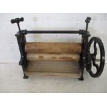 A Harris & Co. cast iron table top mangle