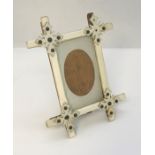A small 19th century ivory photo frame with Gothic detailing