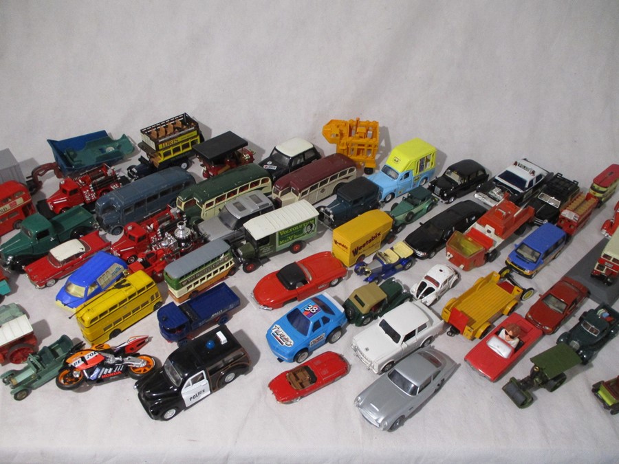 A collection of unboxed die-cast vehicles including Dinky, Corgi, Lledo, Matchbox etc