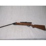 An "Original" .22 cal air rifle (serial number 792437), marked "Made in Germany", with attached