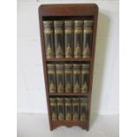 A Small Oak Bookcase together with Fifteen Illustrated Charles Dickens Books published by The