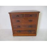 A satin wood chest of five drawers
