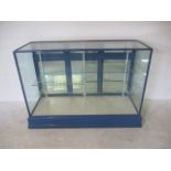 A vintage shop display counter with mirrored doors - height 105cm, width 154cm depth 46cm