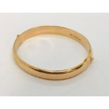A 15ct gold hinged bracelet, 16.2g