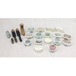 A collection of porcelain musical trinket boxes and decorative miniature shoes
