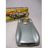 A Silberpfeil Mercedes Silver-Arrow tin plate friction driven open wheel racer model car, No 77,