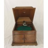 A oak cased HMV table gramophone with original turning handle