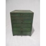 A vintage green painted set of drawers