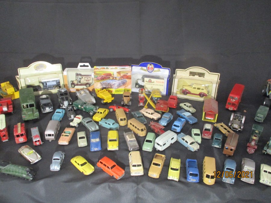 A selection of vintage play worn model cars including Lesney, Corgi and Dinky