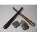 Two wooden truncheons along with a flask