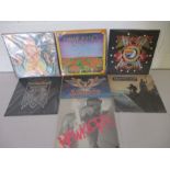 A collection of seven Hawkwind 12" vinyl albums including Space Ritual, In Search of Space, Sonic